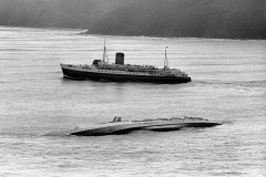 The TEV Maori passes the TEV Wahine the day after the disaster.