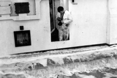 Engineer takes photograph of water on the vehicle deck