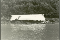 An upturned lifeboat on the eastern shore of Wellington Harbour after wreck of TEV Wahine.