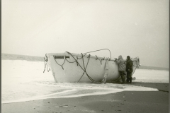 Empty lifeboat ashore at Seatoun after wreck of TEV Wahine.
